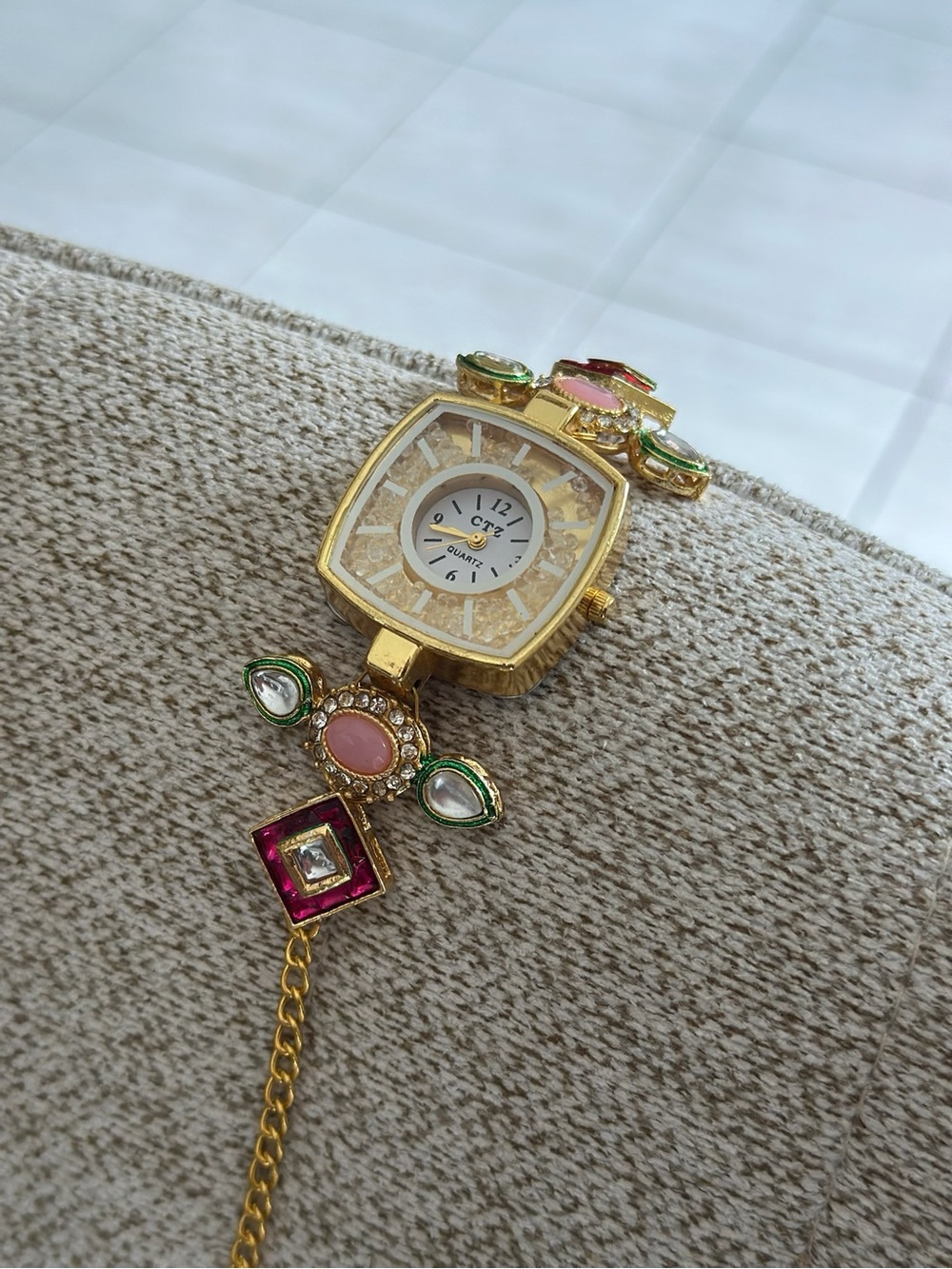 Gold-Tone Women's Bracelet Watch with Pink and Green Stone Accents